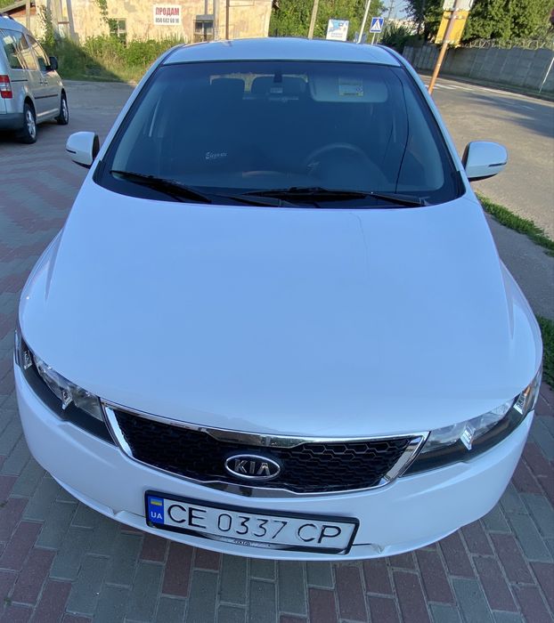Kia Forte 2:0,2012 року газ/бензин