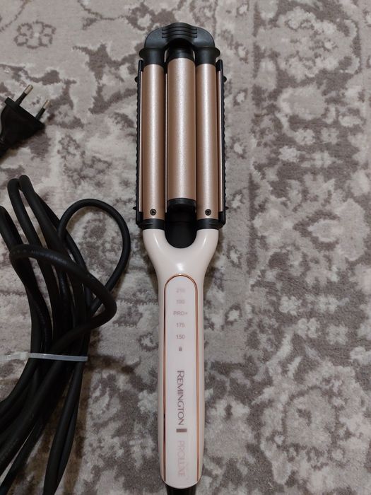 Ondulador REMINGTON 4 em 1 Proluxe CI91AW. Condições muito bom.