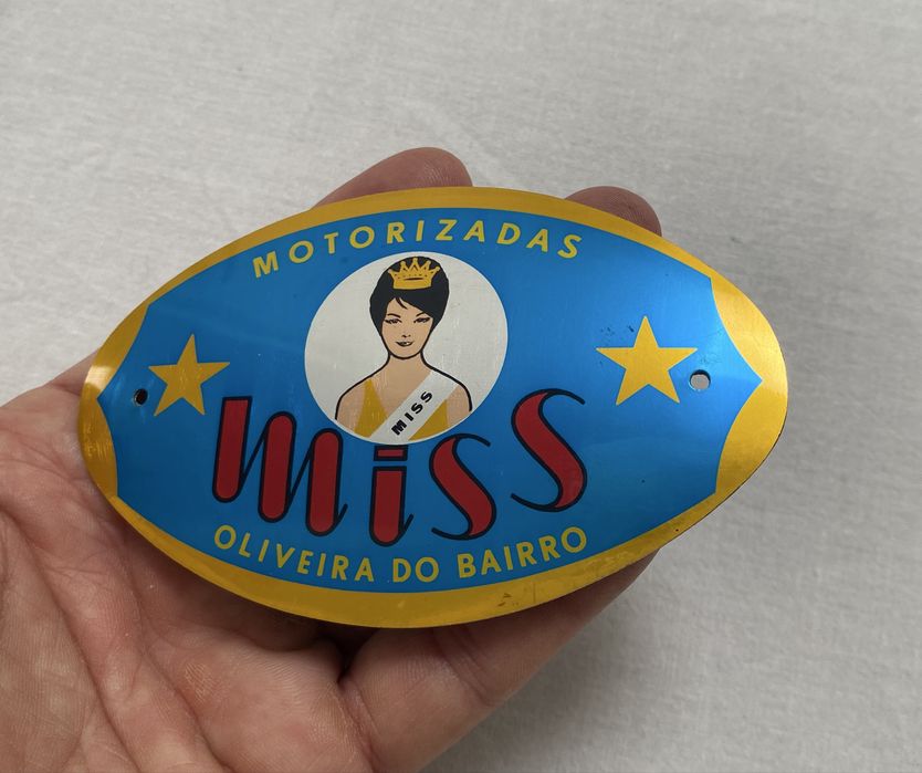 Simbolos emblemas do depósito motorizada Miss Oliveira do Bairro