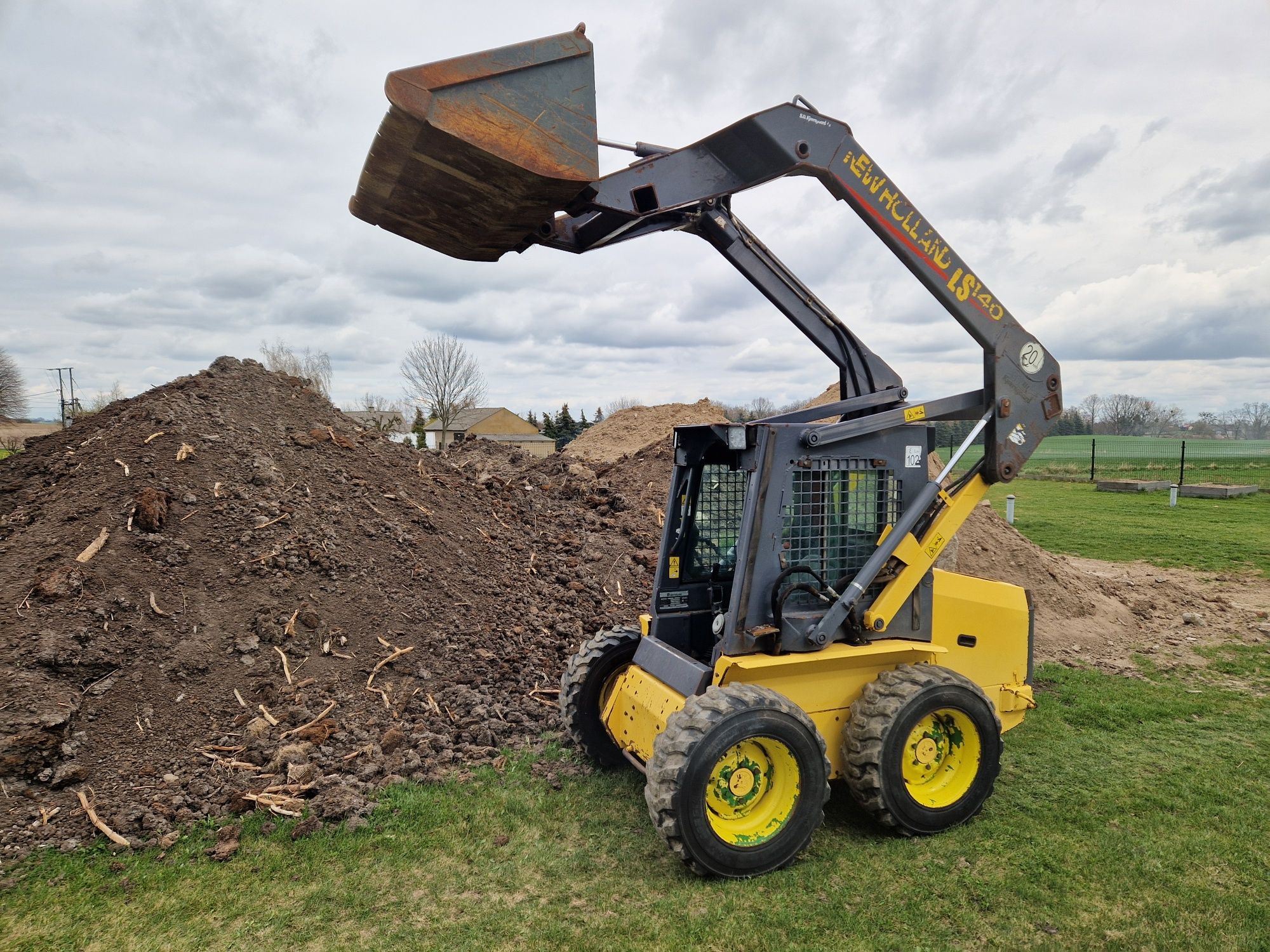 Miniładowarka New Holland LS140 Stan BDB Bobcat