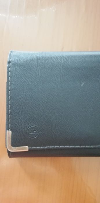 Capa para documentos automóvel, marca Opel, usada

MEDIDAS APROXIMADAS