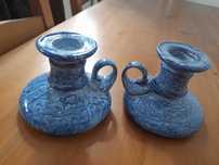 dwa stare świeczniki ceramiczne