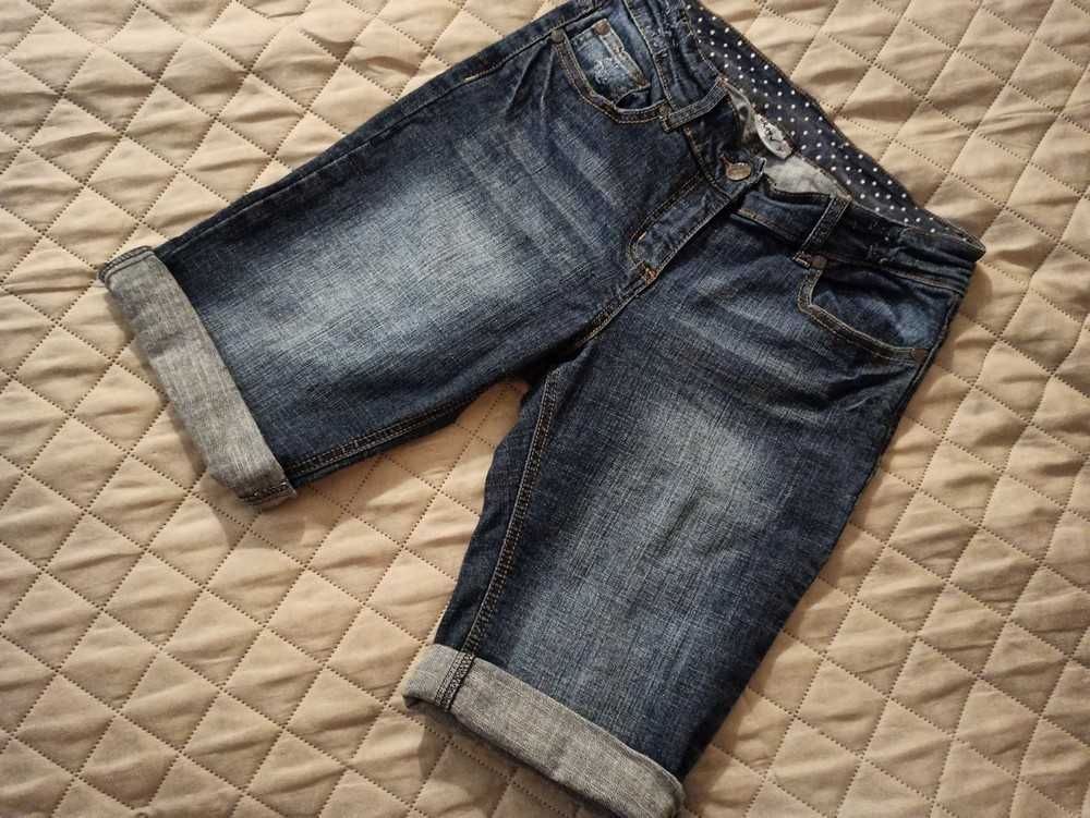 Jeggins jeansy spodnie elastan 38 M wys.stan guziczki