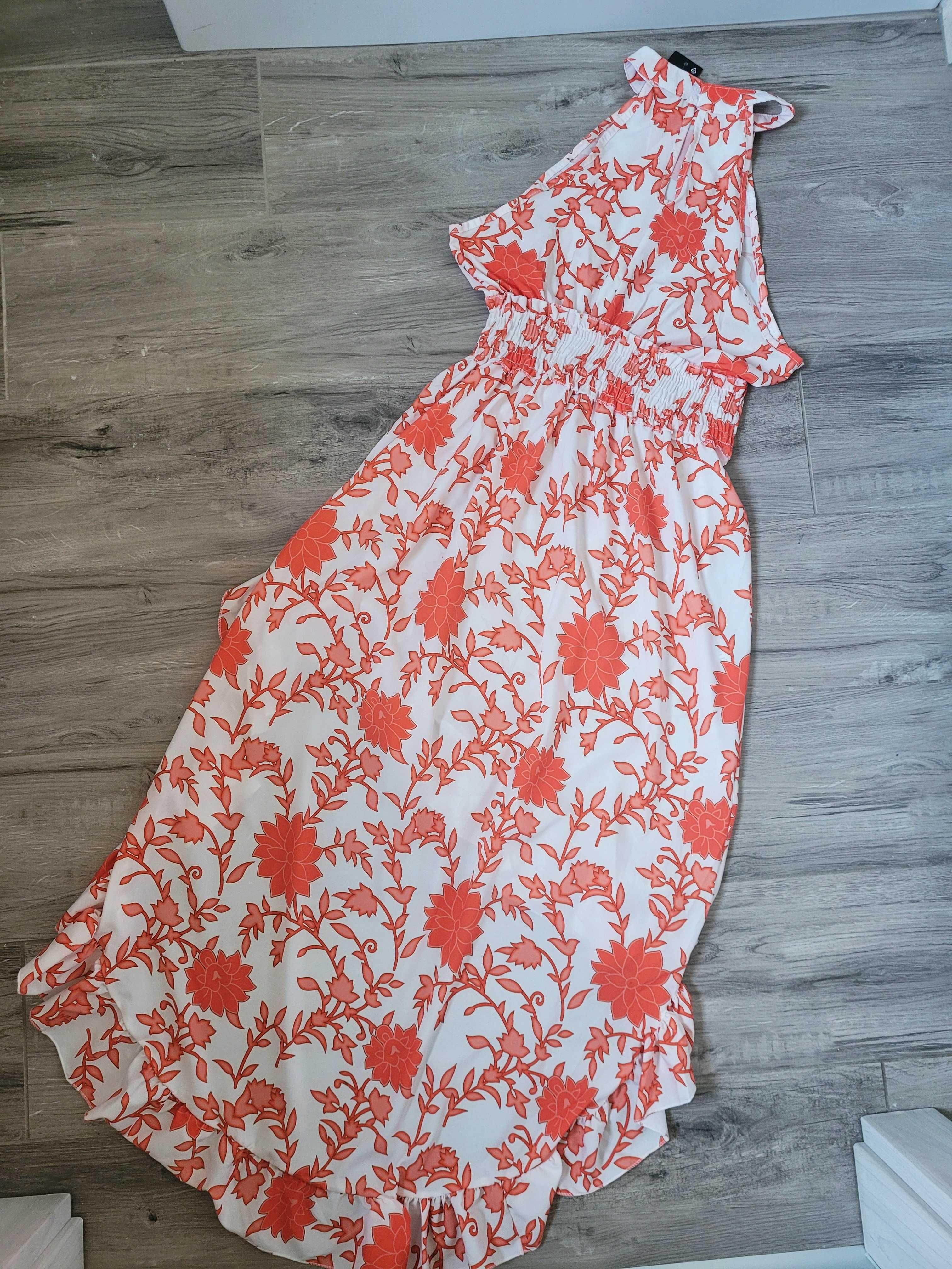 Zwiewna asymetryczna sukienka dekolt halter boho falbana