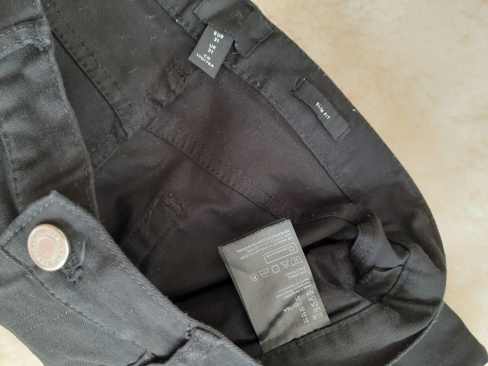 Czarne spodnie jeansowe H&M r. 31