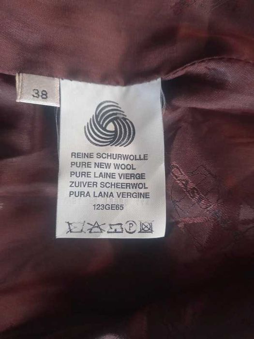 Wełniany, nowy płaszcz z Renomy Wełna 100%