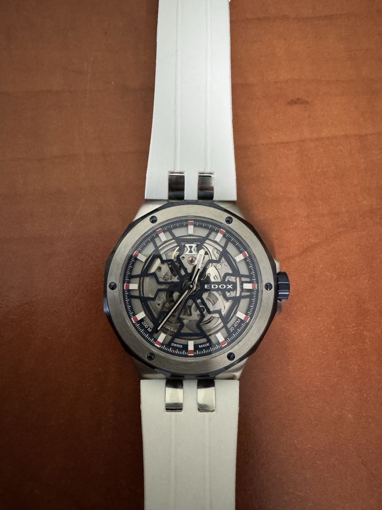 Edox Delfin Mecano nowy, automat, szafir, skeleton