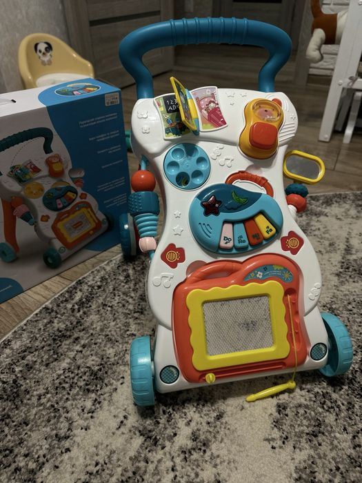 Ходунки каталка з ігровим центром