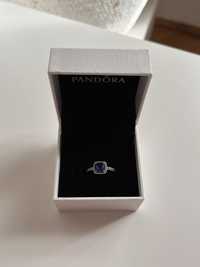 Pandora pierścionek z niebieskim oczkiem rozm. 8