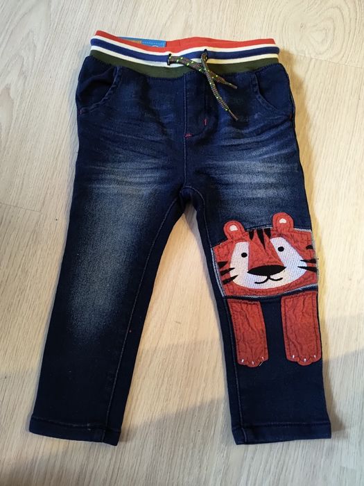 Nowe spodnie jeansowe slim fit r. 86