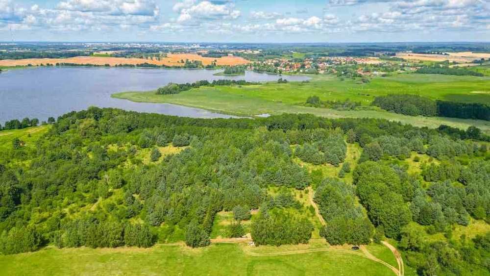 Uwaga obniżka ceny. Sprzedam działkę nad jeziorem.