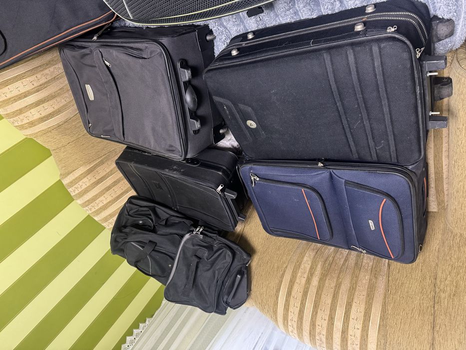 Чемодани, дорожні сумки