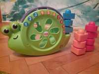 FISHER-PRICE grający śpiewający Ślimak + klocki 10szt