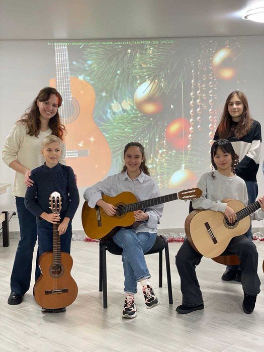 Уроки игры на гитарe Онлайн