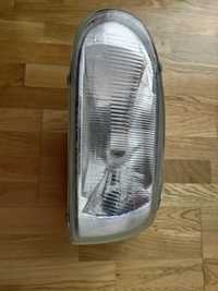 Niemiecka lampa reflektor Hella 144 875 - 00 L PP T40 Vw GOLF 3 Passat