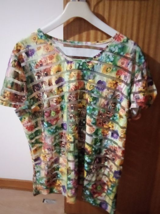 Camiseta  tamanho 46 como nova de senhora