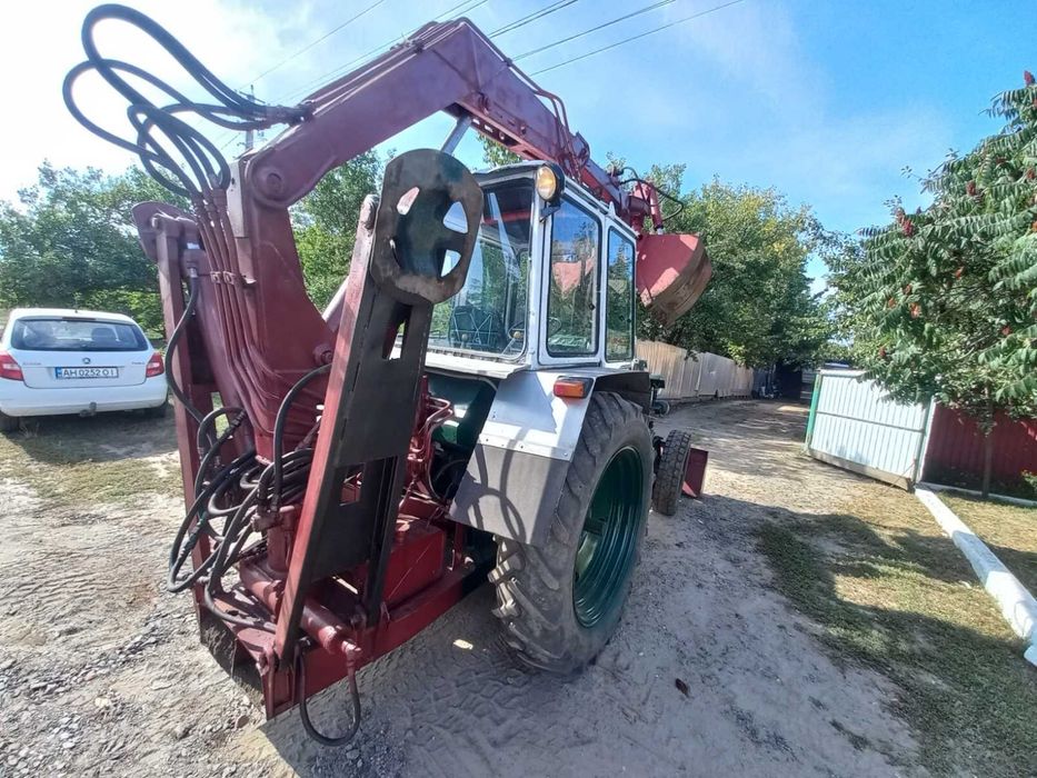 Грейферний погрузчик юмз