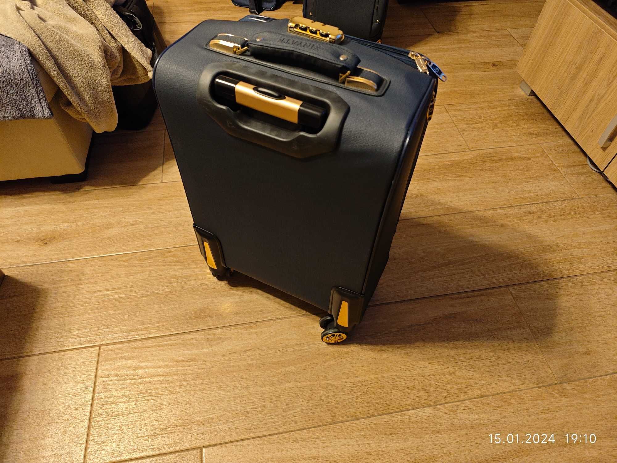 Ekskluzywna walizka średnia podróżna torba bagaż 4x kółka 59x38x27