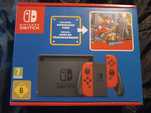 Nintendo Switch + Mario Odyssey.