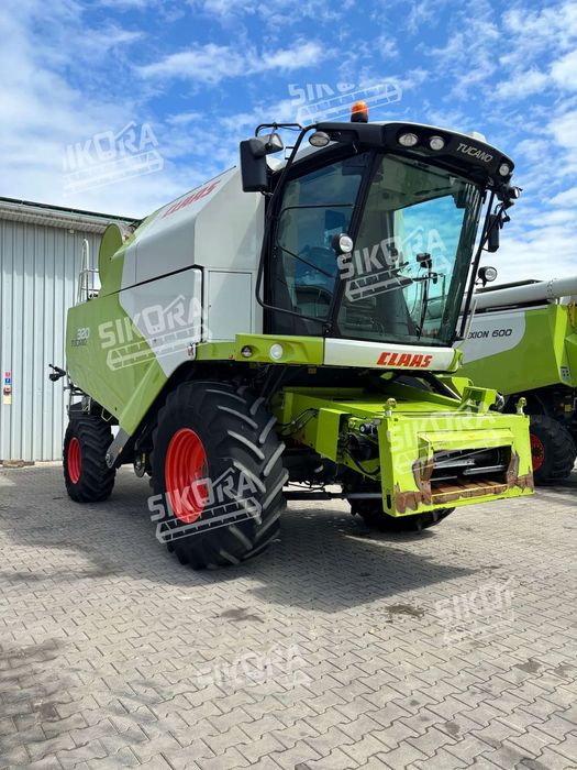 Claas Tucano 320 z hederem  Claas Tucano 320 z hederem