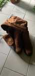 Botas cano alto castanhas
