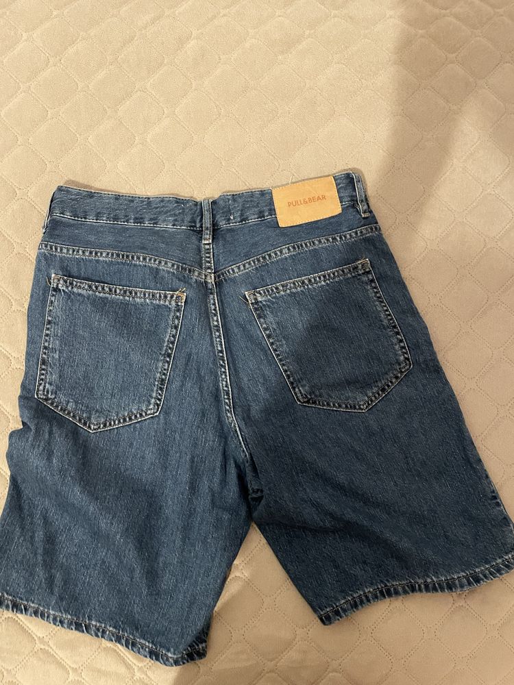 Calções loose fit