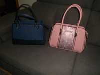 2 carteiras novas cor rosa e outra azul