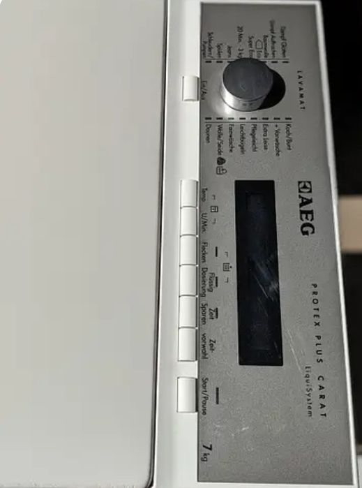 Вузька пральна машина AEG L74270 на 7kg Вертикальне завантаження