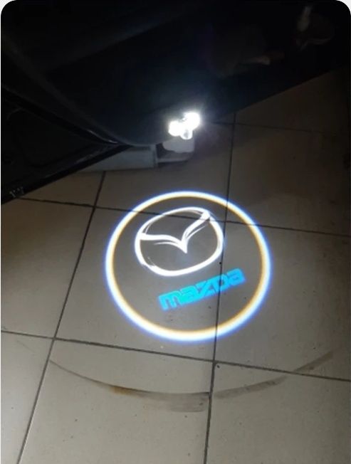 Luz para portas com logótipo Mazda