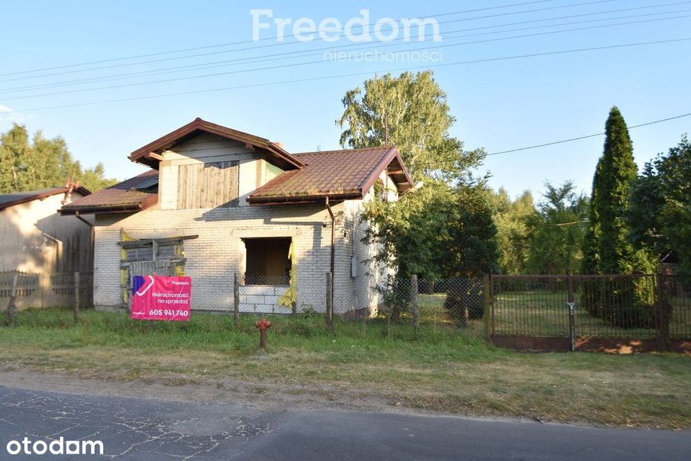 Dom nad rzeką Grabią.