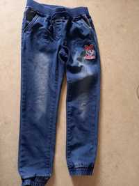 Jeansy niebieskie bawelniane rozmiar 128 niebieskie dżinsy Myszki Miki