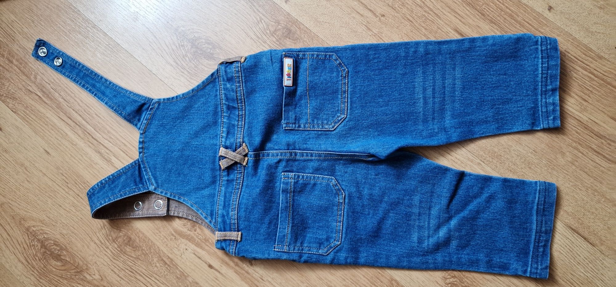 Jeansowe spodnie ogrodniczki rozmiar 80