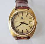 Złocony męski Tissot kwarc