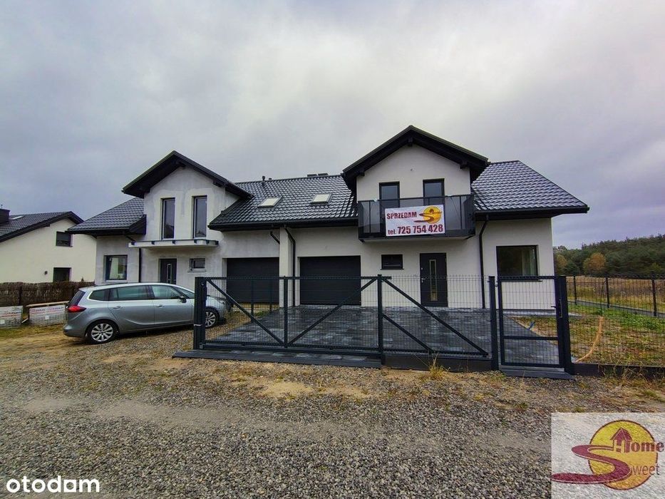 Dom z tarasem/stan surowy zamknięty