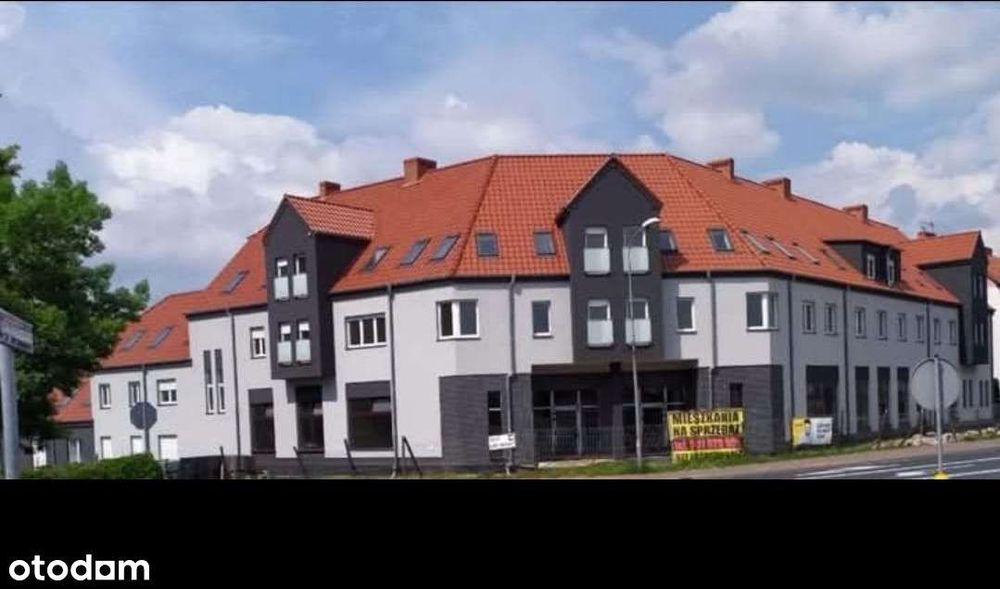 Blok 26 mieszkań i 5 lokali usługowych 2035,29mkw
