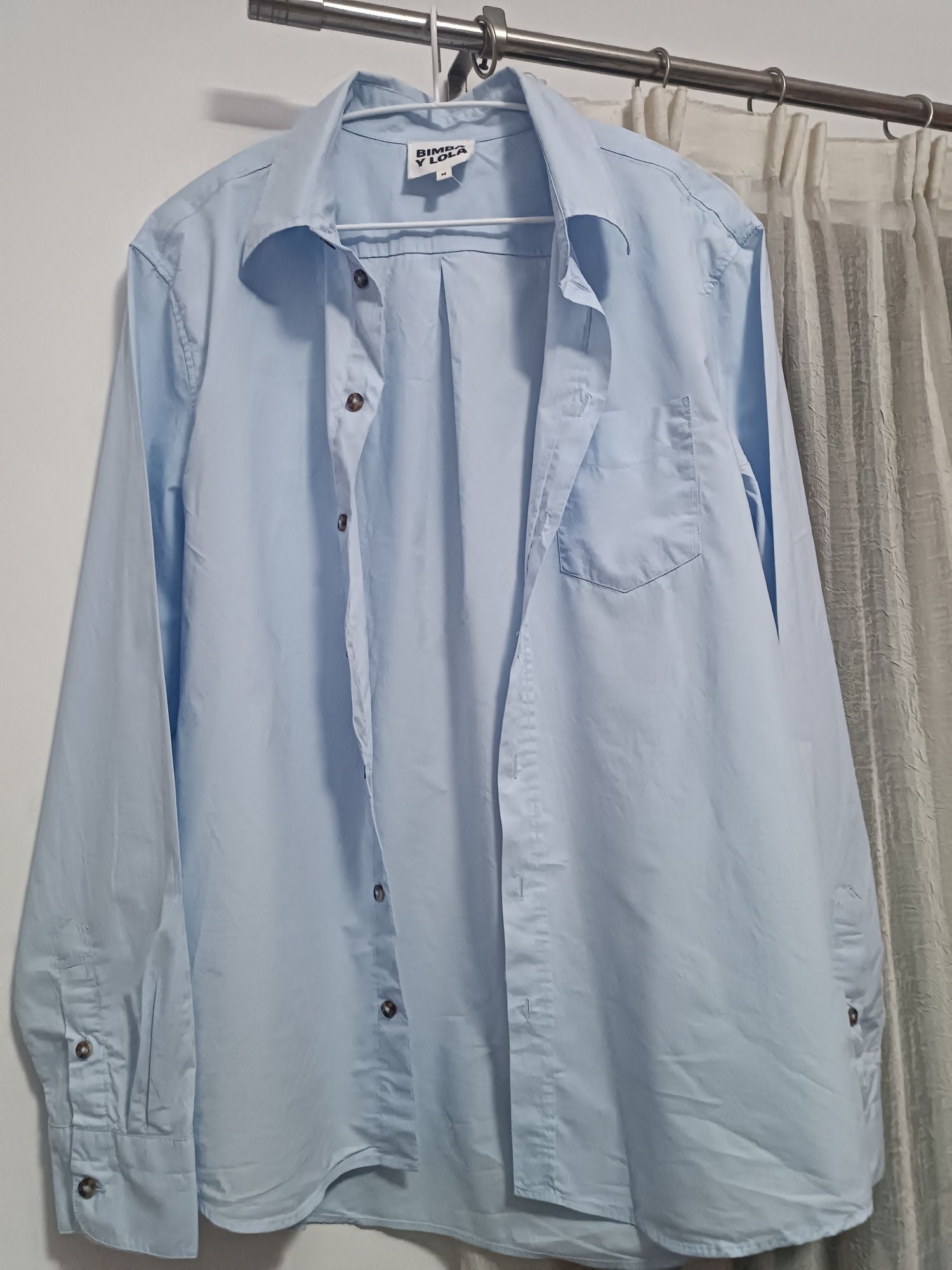 Camisa de senhora
