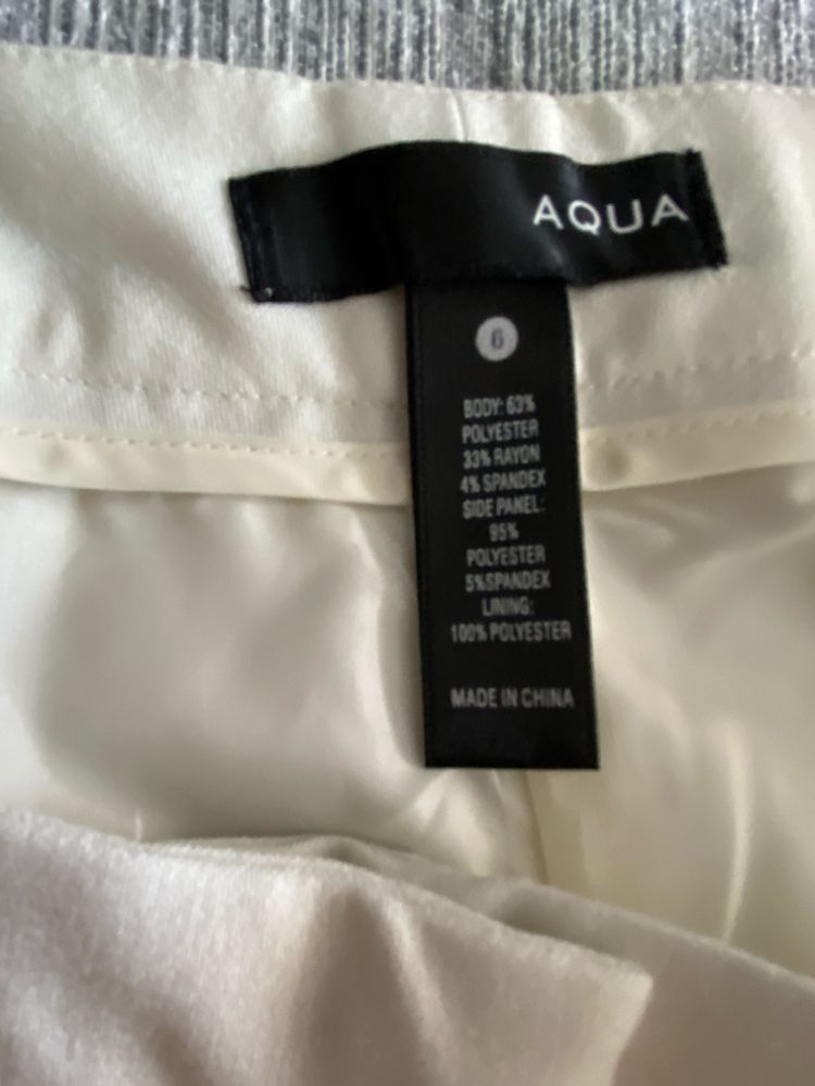 Aqua nowe eleganckie spodnie na podszewce białe z lampasem