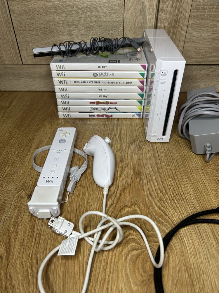 Konsola Wii + kontrolery + gry
