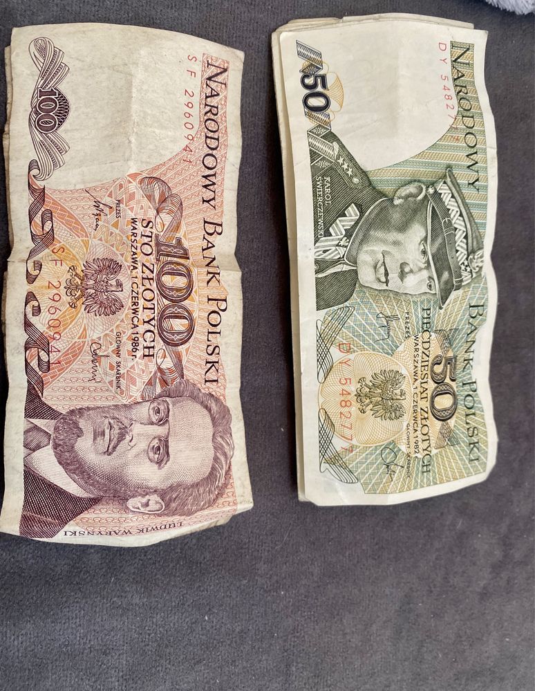 Stare banknoty 50 i 100 złotych.
