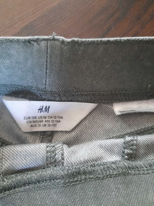 Dwie pary spodni jeansów marki H&M oraz Pepperts r. 158