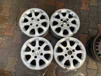 титани диски легкосплавні R15 4 x 114.3 Volvo S40 V40 Dia 67.1 ET44
