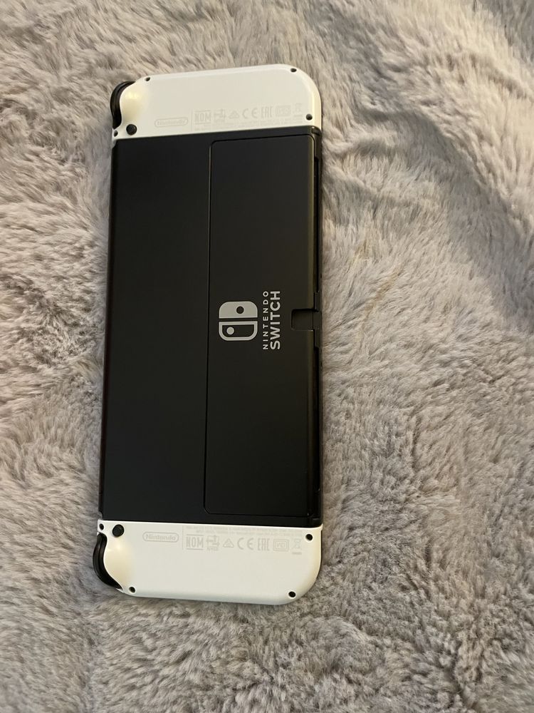 NINTENDO SWITCH OLED( com caixa e jogos à parte)