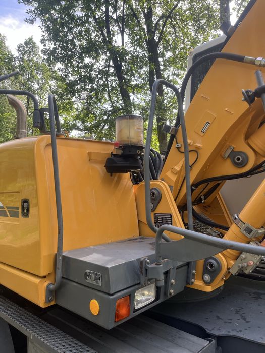 LIEBHERR A312 lift podpory koparka kołowa 314