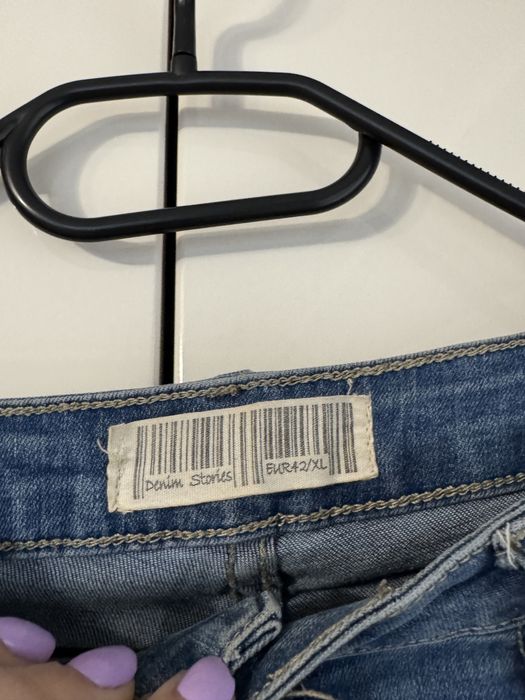 Jeansy damskie z rozdarciami rozmiar L