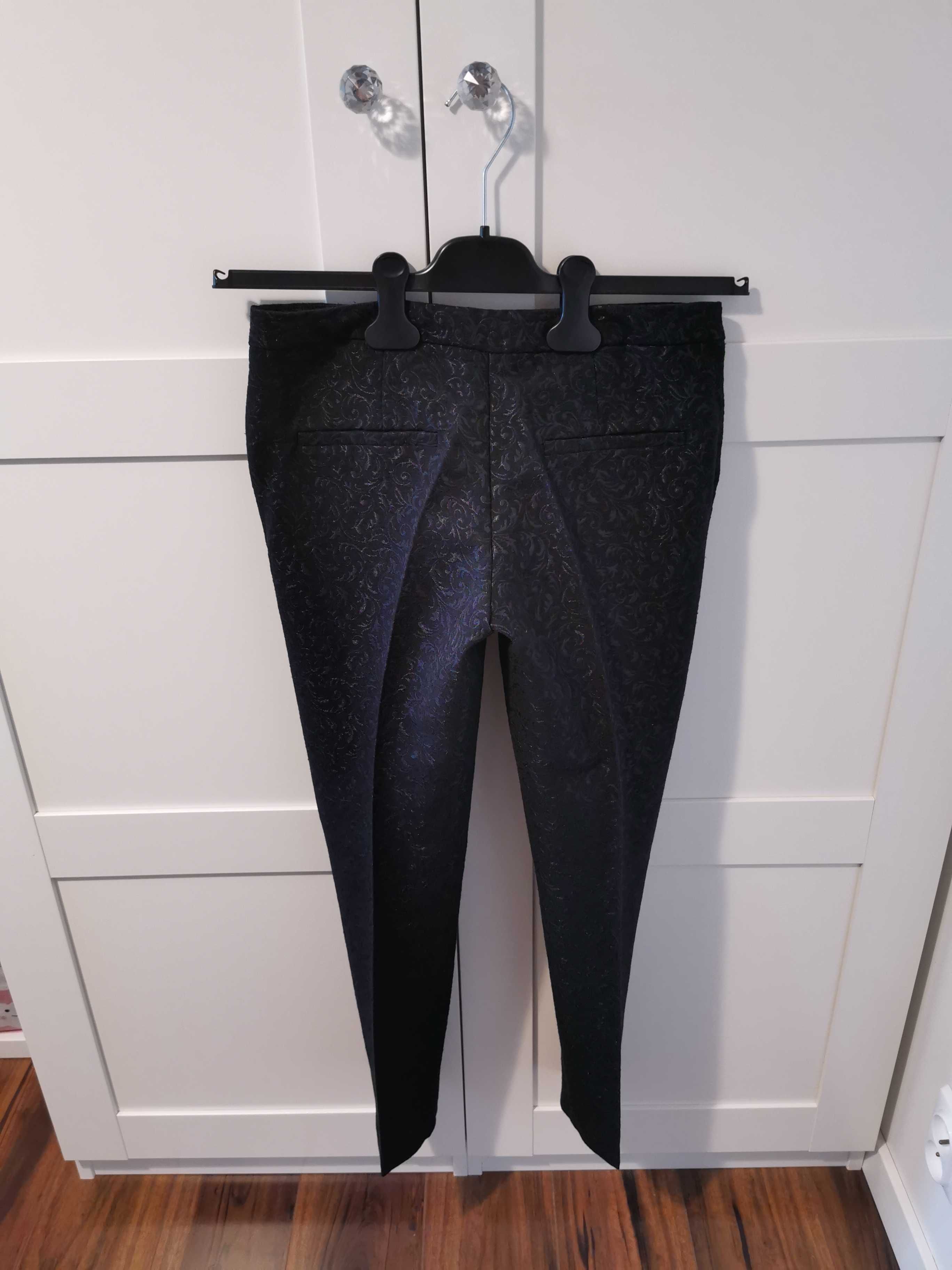 Eleganckie spodnie z kantem, marka Mohito, rozmiar 34