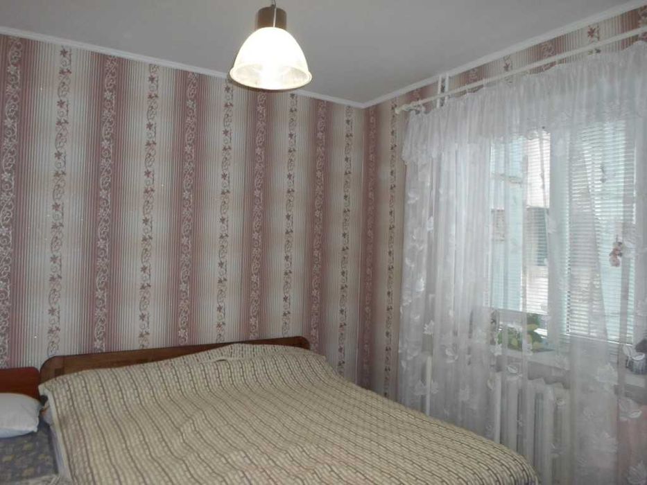 Продаж  4-х кімнатної квартири на Дзержинці