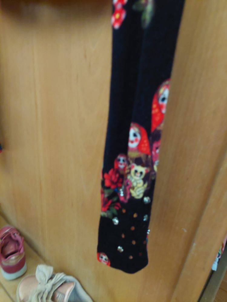 Casaco de malha preto com estampa