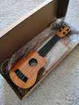 Nowa zabawka gitara ukulele dla dziecka 35 cm długość