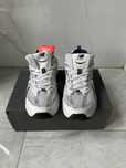 White and silver New Balance