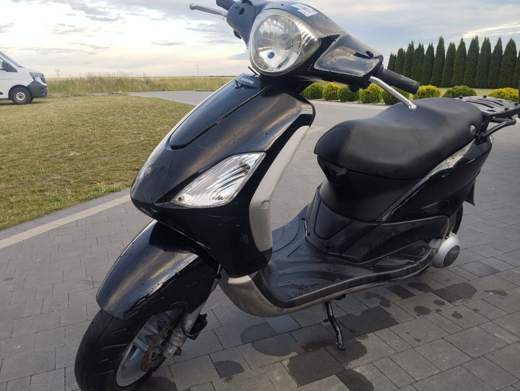 Piaggio FLY 125cm .